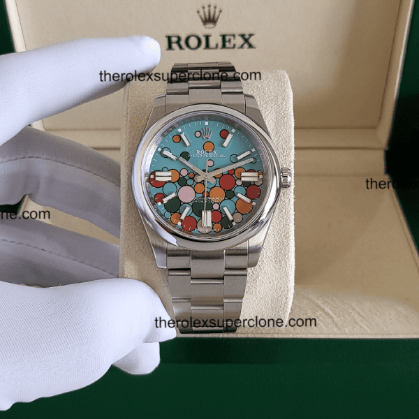 Rolex Oyster Perpetual 1:1 Super Clone Stainless Steel Turquoise Blue Celebration Motif Dial 3230 Swiss Movement Replica Watch Ref-124300