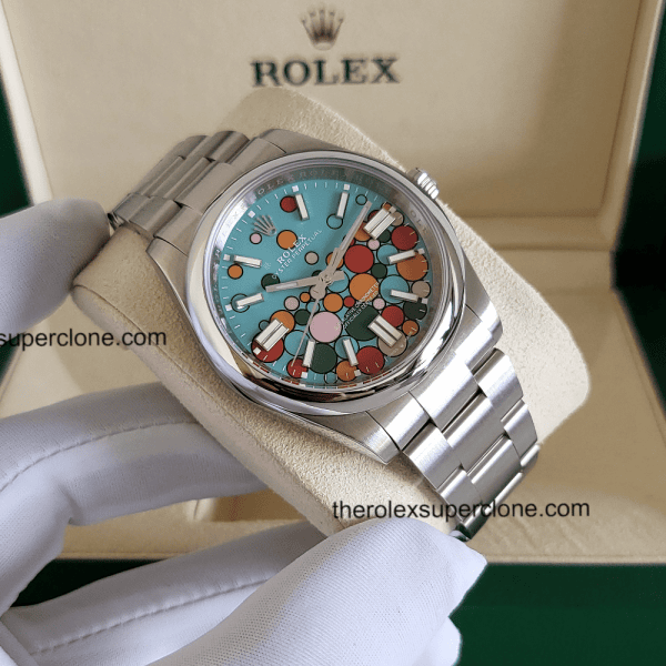 Rolex Oyster Perpetual 1:1 Super Clone Stainless Steel Turquoise Blue Celebration Motif Dial 3230 Swiss Movement Replica Watch Ref-124300