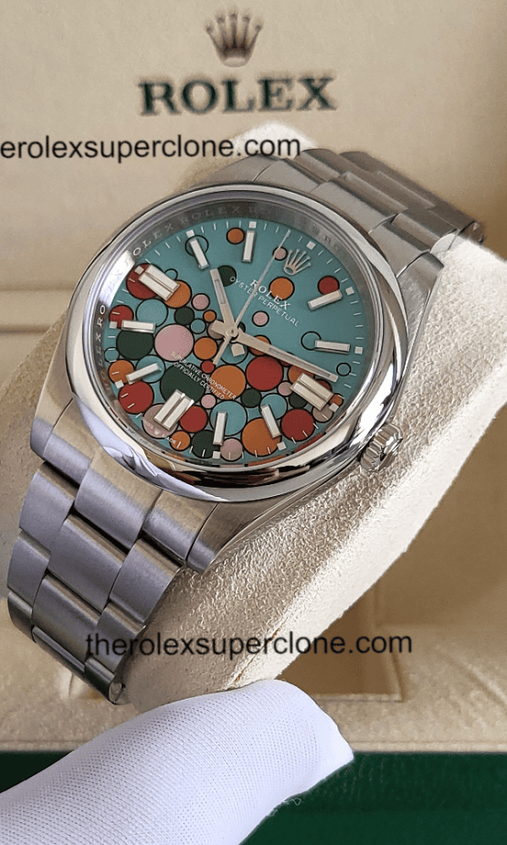 Rolex Oyster Perpetual 1:1 Super Clone Stainless Steel Turquoise Blue Celebration Motif Dial 3230 Swiss Movement Replica Watch Ref-124300