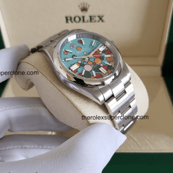 Rolex Oyster Perpetual 1:1 Super Clone Stainless Steel Turquoise Blue Celebration Motif Dial 3230 Swiss Movement Replica Watch Ref-124300