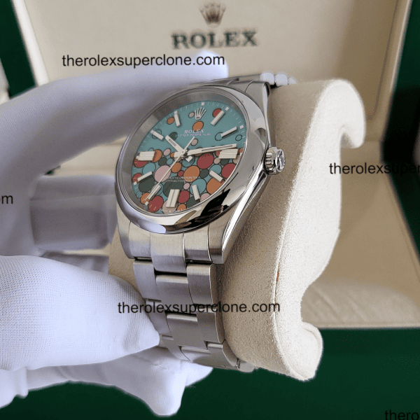 Rolex Oyster Perpetual 1:1 Super Clone Stainless Steel Turquoise Blue Celebration Motif Dial 3230 Swiss Movement Replica Watch Ref-124300